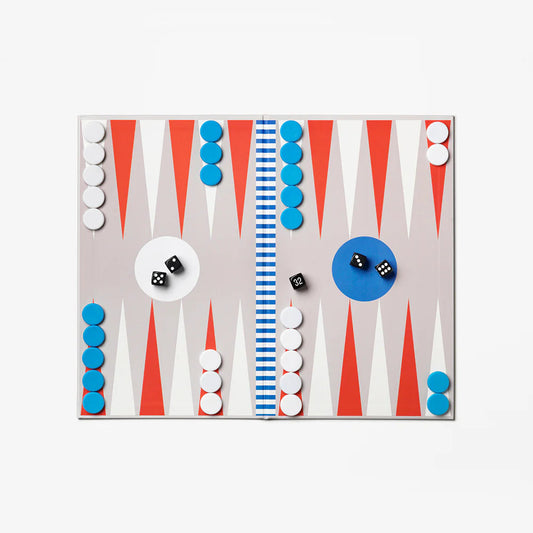 Backgammon board with colorful pieces on a white background