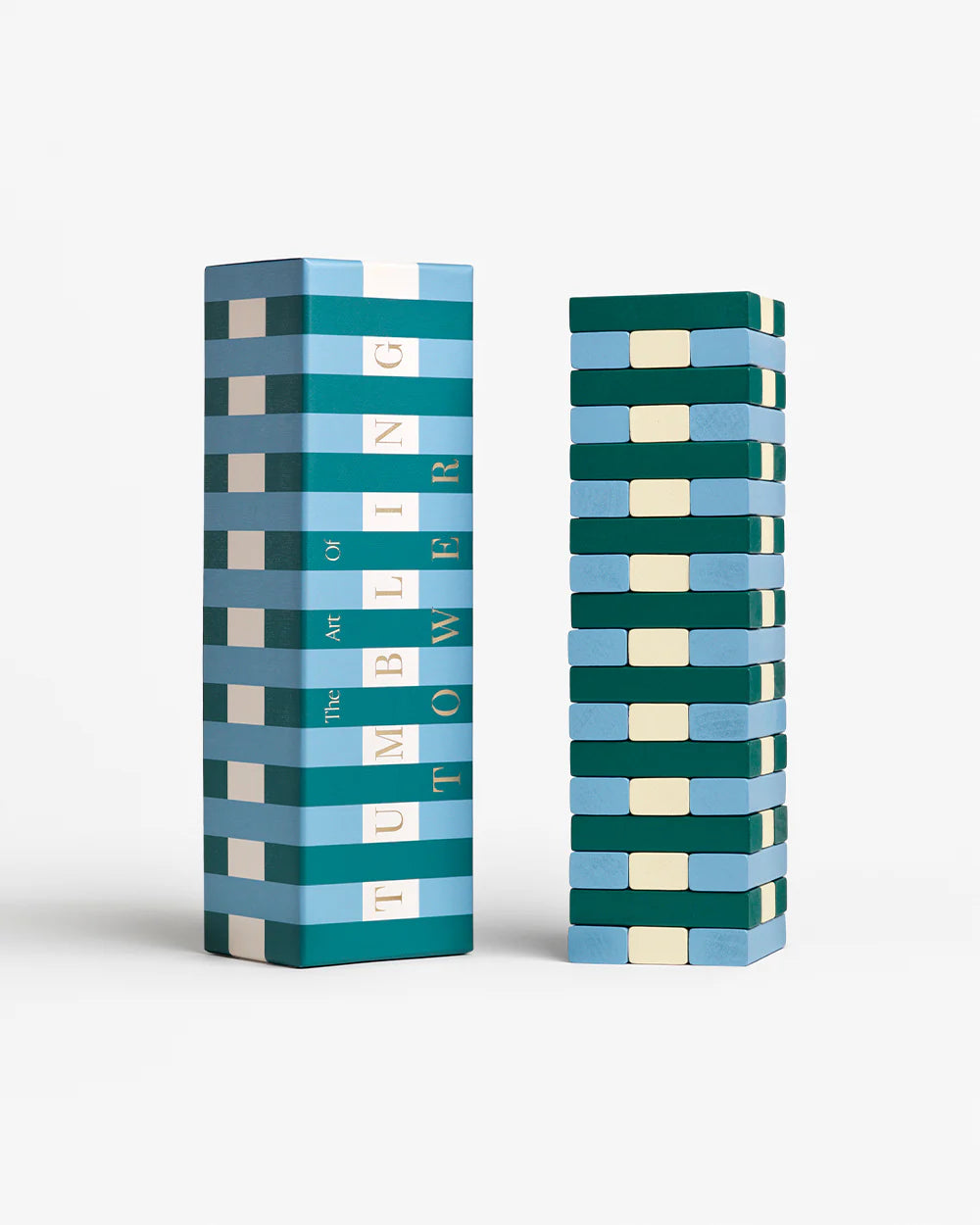 Stack of colorful blocks with a matching box on a white background