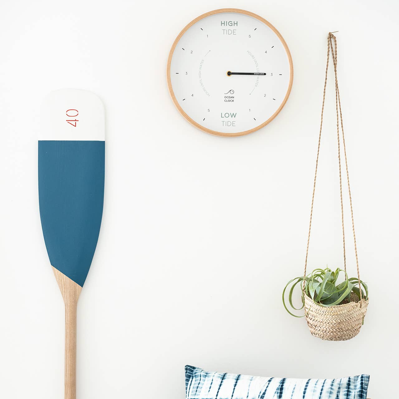 White wooden tide clock