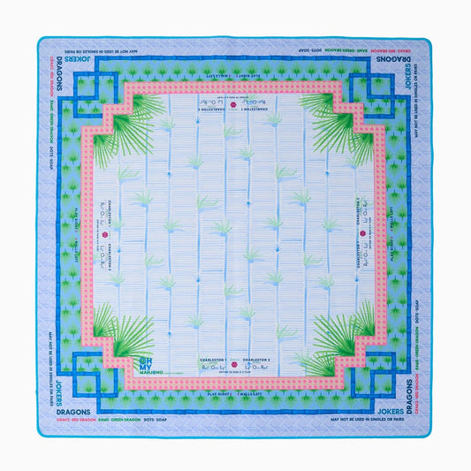 Board game mat with grid layout and decorative elements on a white background