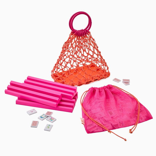 Set of pink and orange items including a net bag, drawstring bag, and rectangular objects on a white background.